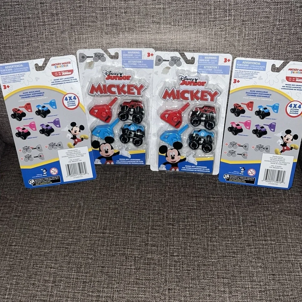 Disney‎ Junior Mickey Mouse Micro key launchers 4 Packs Of 2 Red & Blue Trucks